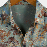 CAMISA DE MANGA CORTA CON BOLSILLO Y ESTAMPADO FLORAL