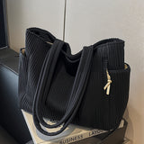 HANNA™ | BOLSO DE MANO ACANALADO CON DETALLE DE CORDÓN