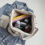 HANNA™ | BOLSO DE MANO ACANALADO CON DETALLE DE CORDÓN