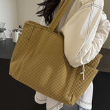 HANNA™ | BOLSO DE MANO ACANALADO CON DETALLE DE CORDÓN